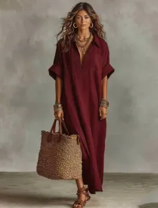 Casual burgundy short sleeve V-neck maxi dress paired with a woven straw bag detail.