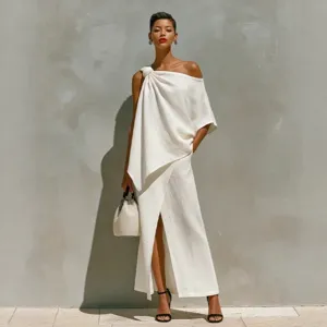 White asymmetric one-shoulder top and front-split long skirt set for women fashion.
