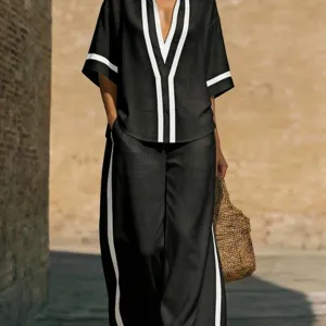 Women casual two piece set short sleeve V-neck top and contrast stripe wide leg trousers outfit.