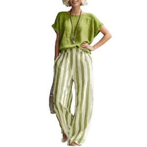 Women green short sleeve top and striped wide leg pants outfit set summer fashion style