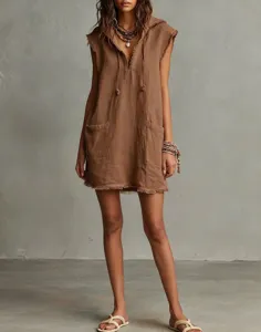 Sleeveless hooded mini dress detail shot featuring raw fringe edges and front pockets design.