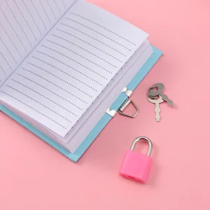 Cute diary notebook with lock and keys, dotted pages for kids and daily journaling.
