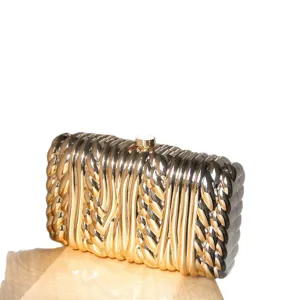 Metallic twisted hard clutch bag with minimalist design for women evening party events.