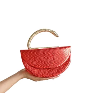 Red snake pattern semi-circular evening clutch bag with unique gold snake metal handle for women.