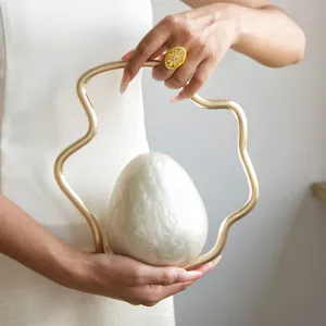 French style irregular pearl egg clutch unique gold handle evening bag chic aesthetic purse