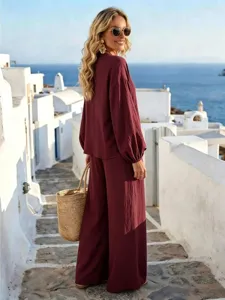 Detail view of the elegant autumn long-sleeve shirt and loose pants set, perfect for resort wear.