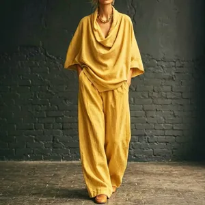 Loose cotton linen two piece set featuring a chic cowl neck top and elegant wide leg pants.