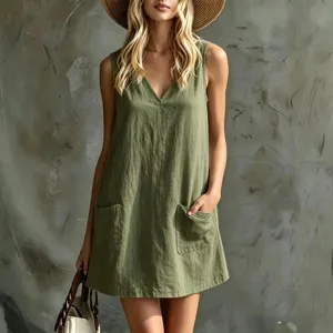 Detail shot of a summer V-neck sleeveless dress featuring dual patch pockets in army green.