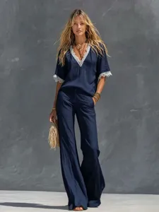 Detailed view of the stylish summer lace V-neck short sleeve top and wide leg pants set.