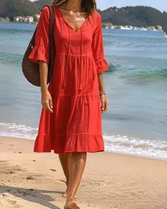 Boho red v-neck tiered midi dress with tassel ties and bell sleeves for women beach holiday.