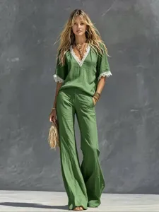 Green summer women two piece outfit detail, V neck short sleeve lace top and wide leg pants.