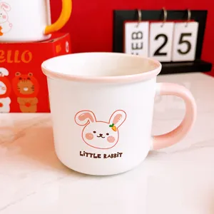 Tasse à café en céramique mignonne avec anse rose et joli imprimé de lapin, idéale pour le petit dé.