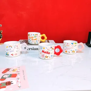 Cute cartoon ceramic mug with flower handle, showing detailed doodle cup design.