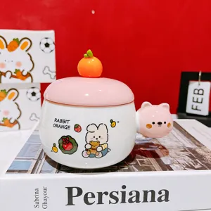 Cute ceramic mug with lid and bear handle, cartoon rabbit design, ideal coffee or milk cup.