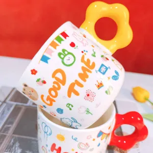 Cute ceramic coffee mug with floral handle, cartoon printed milk cup for daily use or gift.