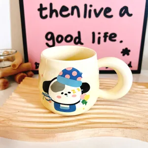 Cute cartoon dog ceramic mug with big handle, aesthetic coffee cup for girls and daily gift use.