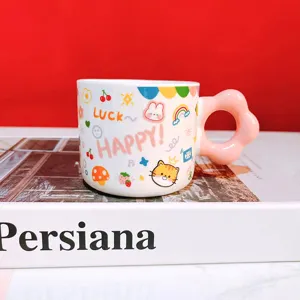 Cute ceramic coffee mug with unique flower handle and cartoon print detail view showcase.