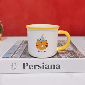 Cute cartoon tiger ceramic mug detail shot, featuring yellow handle and rim, nice gift choice.