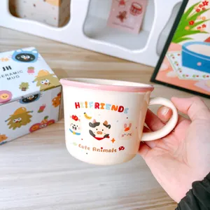 Cute ceramic coffee mug with adorable cartoon animals print and pink rim for daily use.