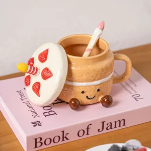 Ceramic cake mug detail view with strawberry lid, cute spoon, and lovely dessert design.