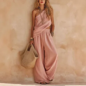 Elegant women's pink linen two-piece set, asymmetric one-shoulder top and wide leg pants.