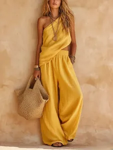Stylish casual two-piece outfit with one-shoulder top and wide-leg pants for women.