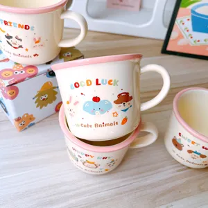 Cute ceramic coffee mug with pink rim and lovely cartoon animal design for home use.