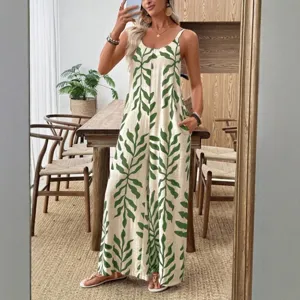 Women's tropical leaf print V-neck pocket jumpsuit, casual spaghetti strap long pant outfit.