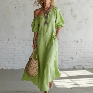 Elegant off-the-shoulder puff sleeve maxi dress for women, casual cotton vacation wear.