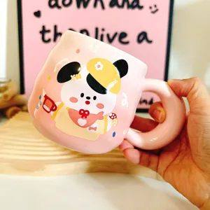 Pink ceramic cute cartoon puppy mug detail view with large handle for daily coffee drinking