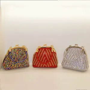 Shiny rhinestone evening bag with metal clasp, elegant crystal clutch purse for women.