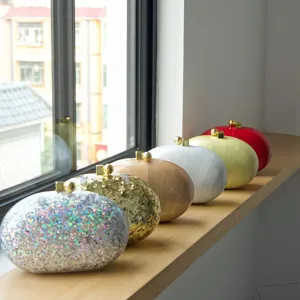 Acrylic marble clutch bag evening minaudiere set featuring multiple colors and glitter.