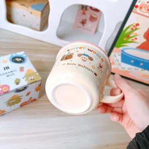 Ceramic mug with cute animal prints, pink lid, perfect gift for kids, girls, and birthdays.