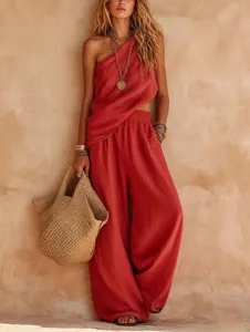 Detailed view of women casual two-piece linen set, one-shoulder top and wide-leg pants.