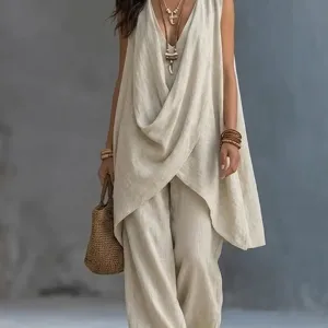 Sleeveless draped top and wide leg pants set, casual solid color beach outfit for summer.