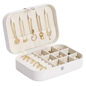 Portable travel jewelry box cream white PU leather organizer with ring slots and necklace hooks