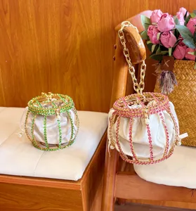 Shiny rhinestone cage handbag with soft velvet inner pouch and metal chain for evening party events.