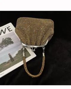 Shiny evening rhinestone shell clutch bag with elegant metal handle for party use.