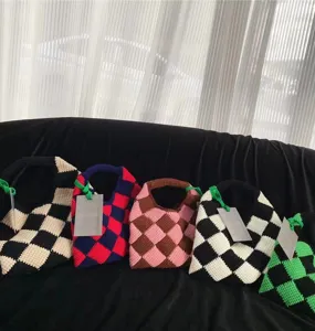 Handmade crochet checkerboard tote bag, color-blocked knitted handbag for women.