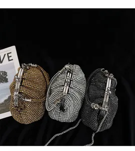 Sparkling rhinestone evening clutch bag with metal kiss-lock frame and chain strap for women.