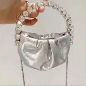 Silver pleated mini evening bag with chunky crystal rhinestone handle and chain strap chic