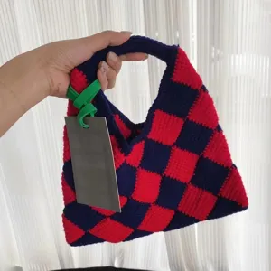 Handmade checkered crochet tote bag, stylish red and blue color-block wool handbag.