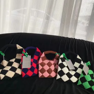 Handmade crochet checkerboard tote bag, colorblock knitted wool shopping handbag main view.