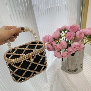 Pearl handle rhinestone evening bag detail, sparkling diamond lattice design, luxury clutch.