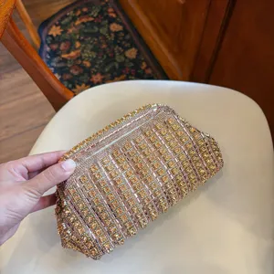 Stunning rhinestone evening clutch bag detail, sparkling crystal dumpling design for party wear.