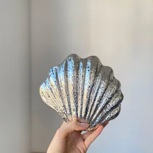 Metallic silver shell clutch bag, glossy acrylic evening handbag for women trendy party accessory.