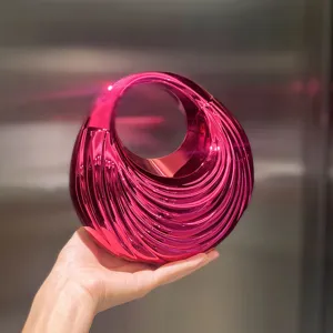 Metallic pink acrylic handbag with unique ribbed swirl design, vintage style irregular tote bag.