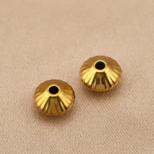 Perles gyro à rayures verticales en acier inoxydable pour bracelet DIY. Détail de perle d'espacement.