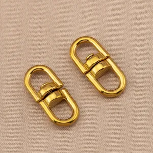 Dettaglio fibbia girevole in acciaio inossidabile, accessori metallici dorati borse.