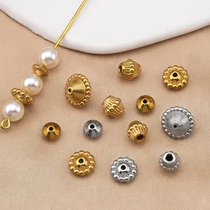 Perles toupie en acier inoxydable et intercalaires en métal cannelé pour bijoux.